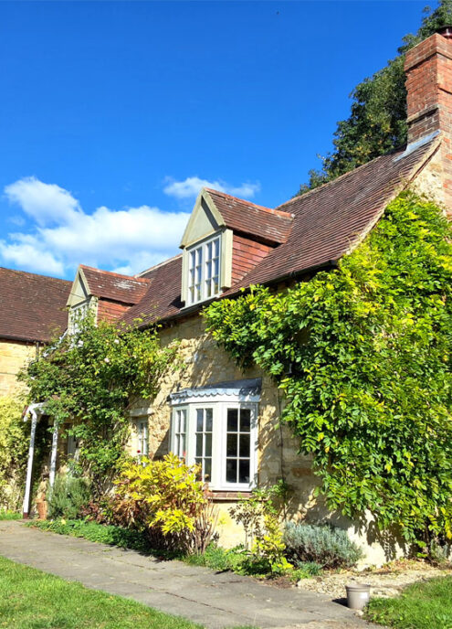 Exterior of home showing bay windows and casement windows 2 Bay Windows, Casement Windows and French Doors, Beckley, Oxford. Woodcraft Windows.